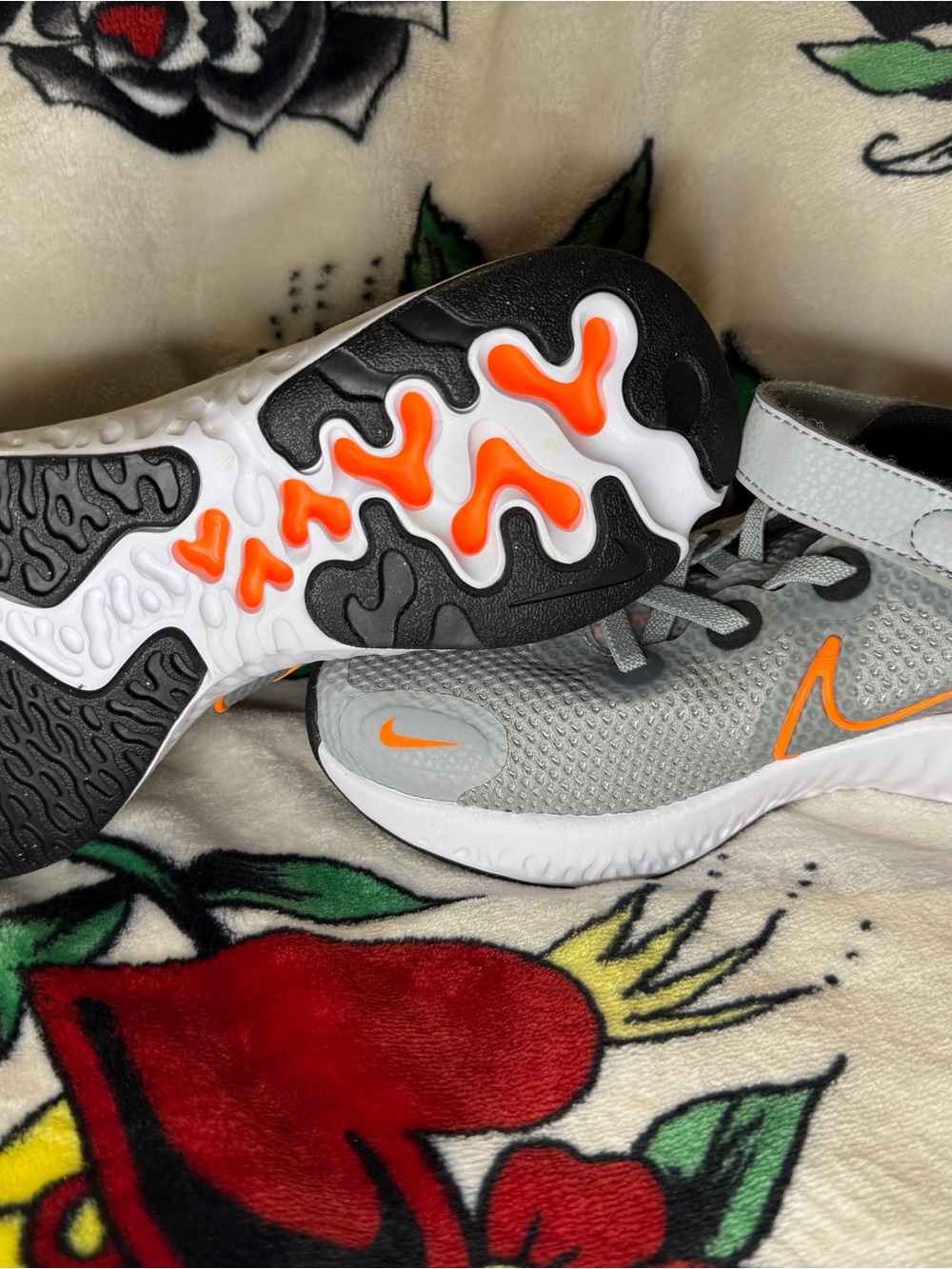 Nike Kids Gray Sneakers with Orange Accents